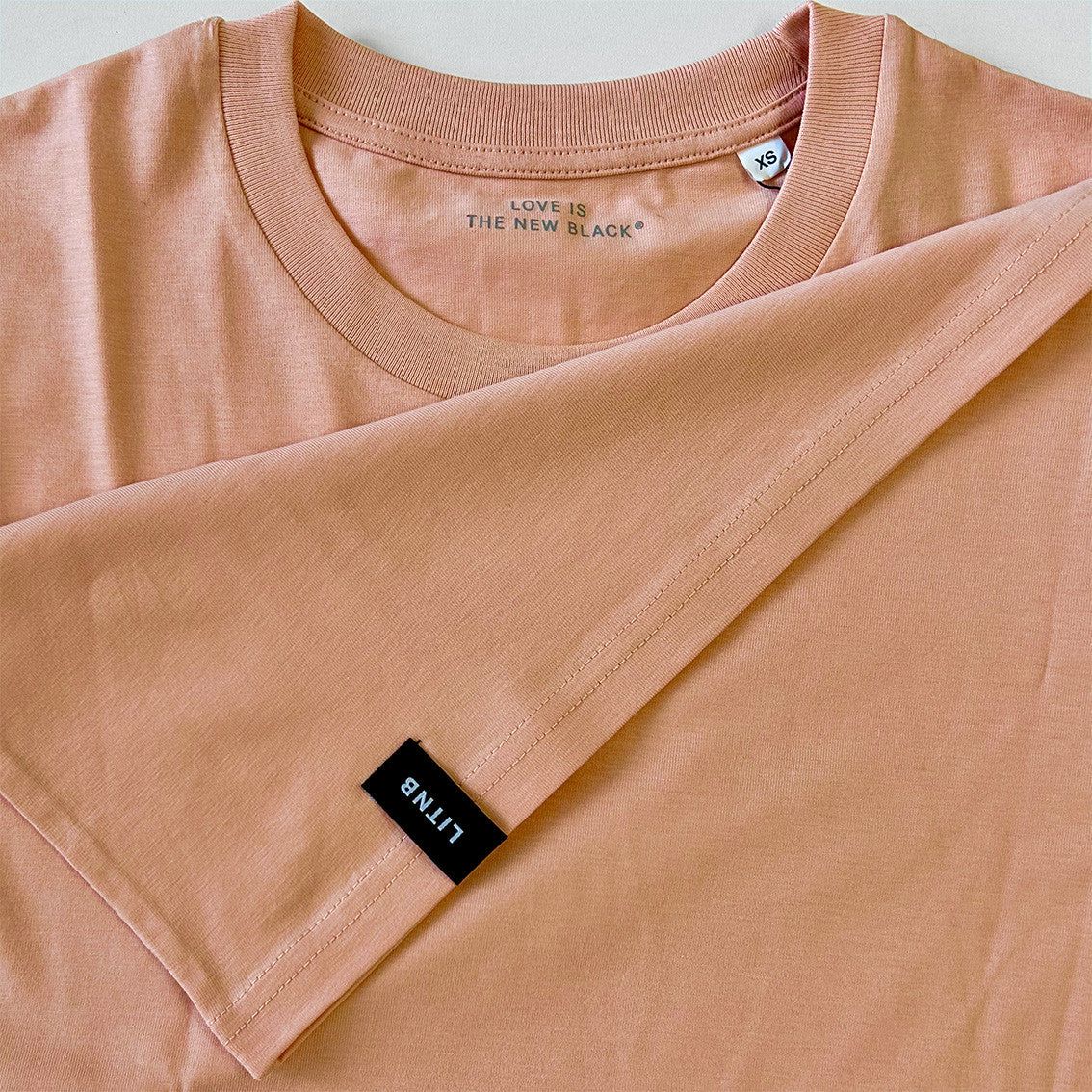 All we have is now / Peach T-Shirt mit Print